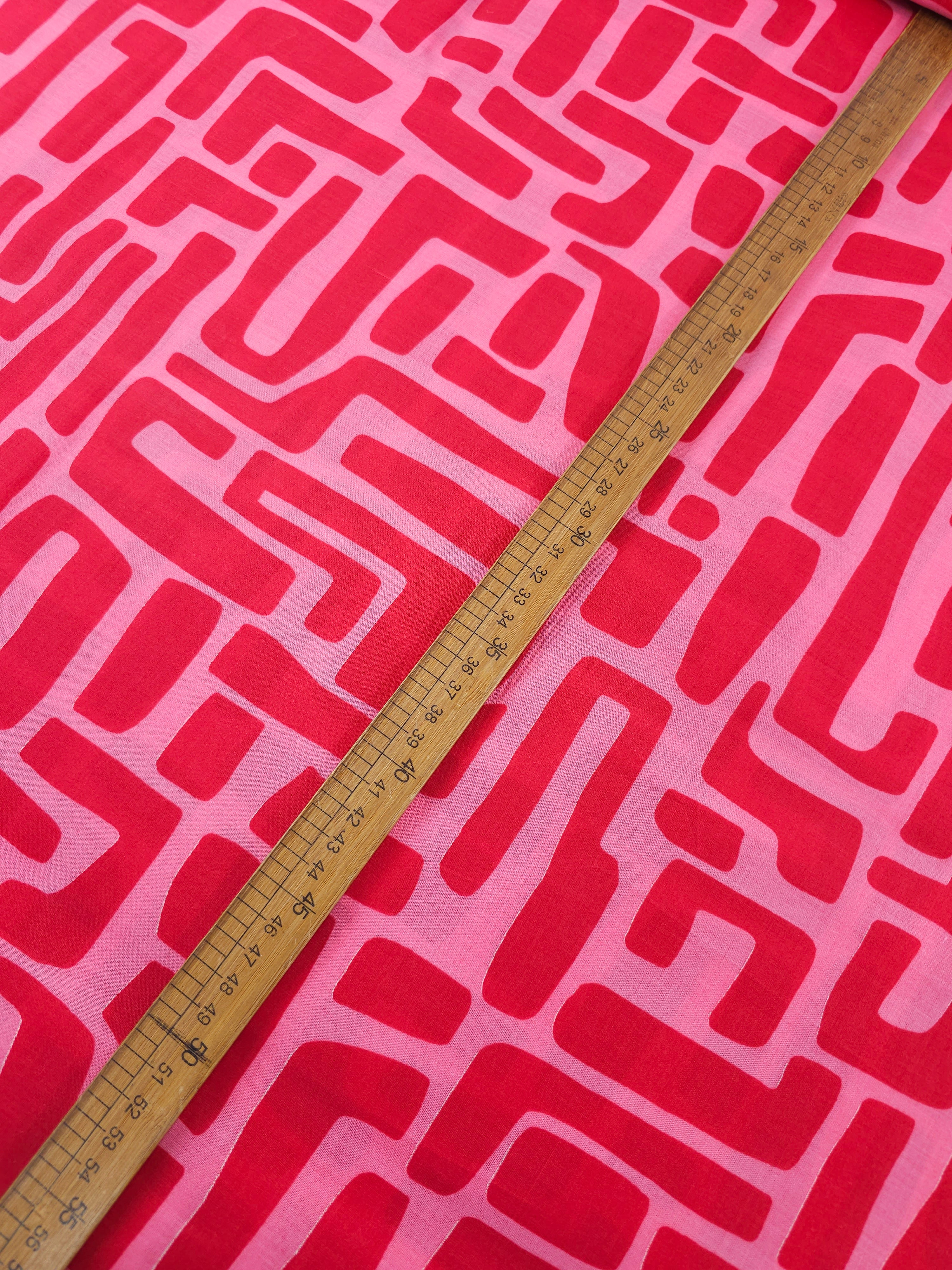 Red/Pink Abstract Maze Coated Cotton 60"