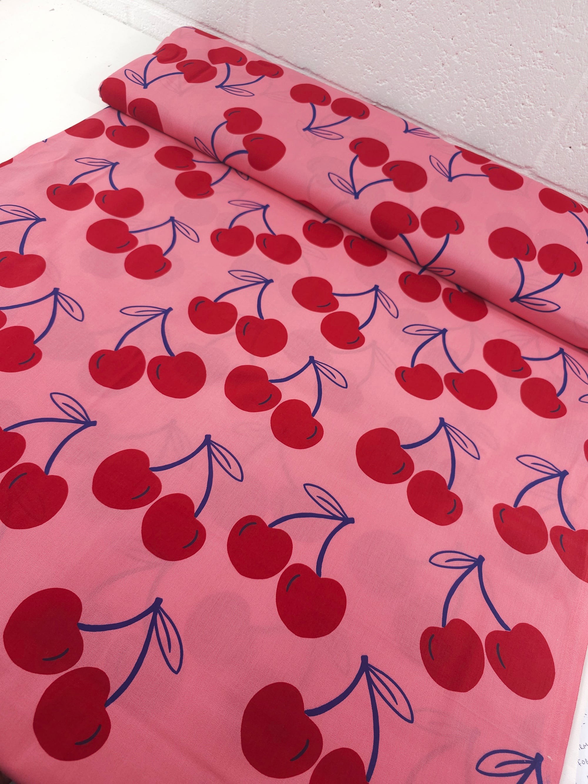 Fuchsia Pink Large Cherries Coated Cotton 60"