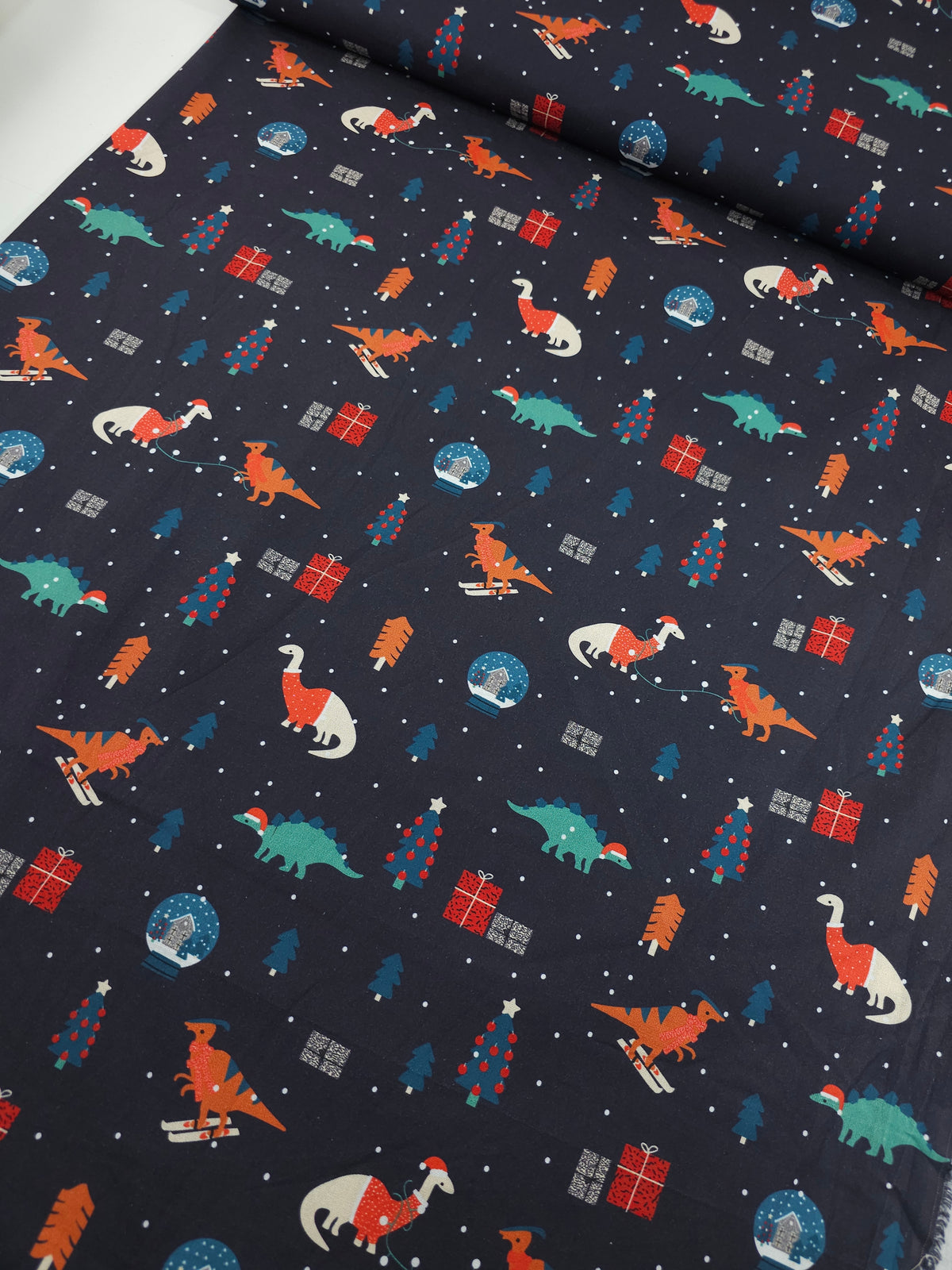 Indigo Navy Dino Christmas 100% Cotton - Joann