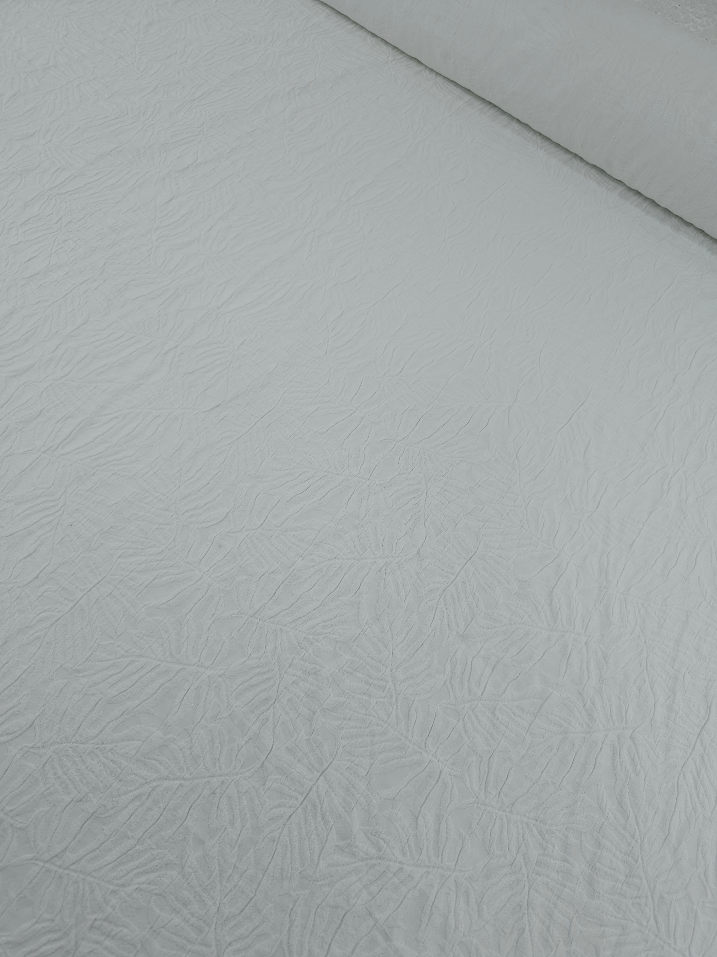White Embossed Palm Leaf Poly Cotton Stretch