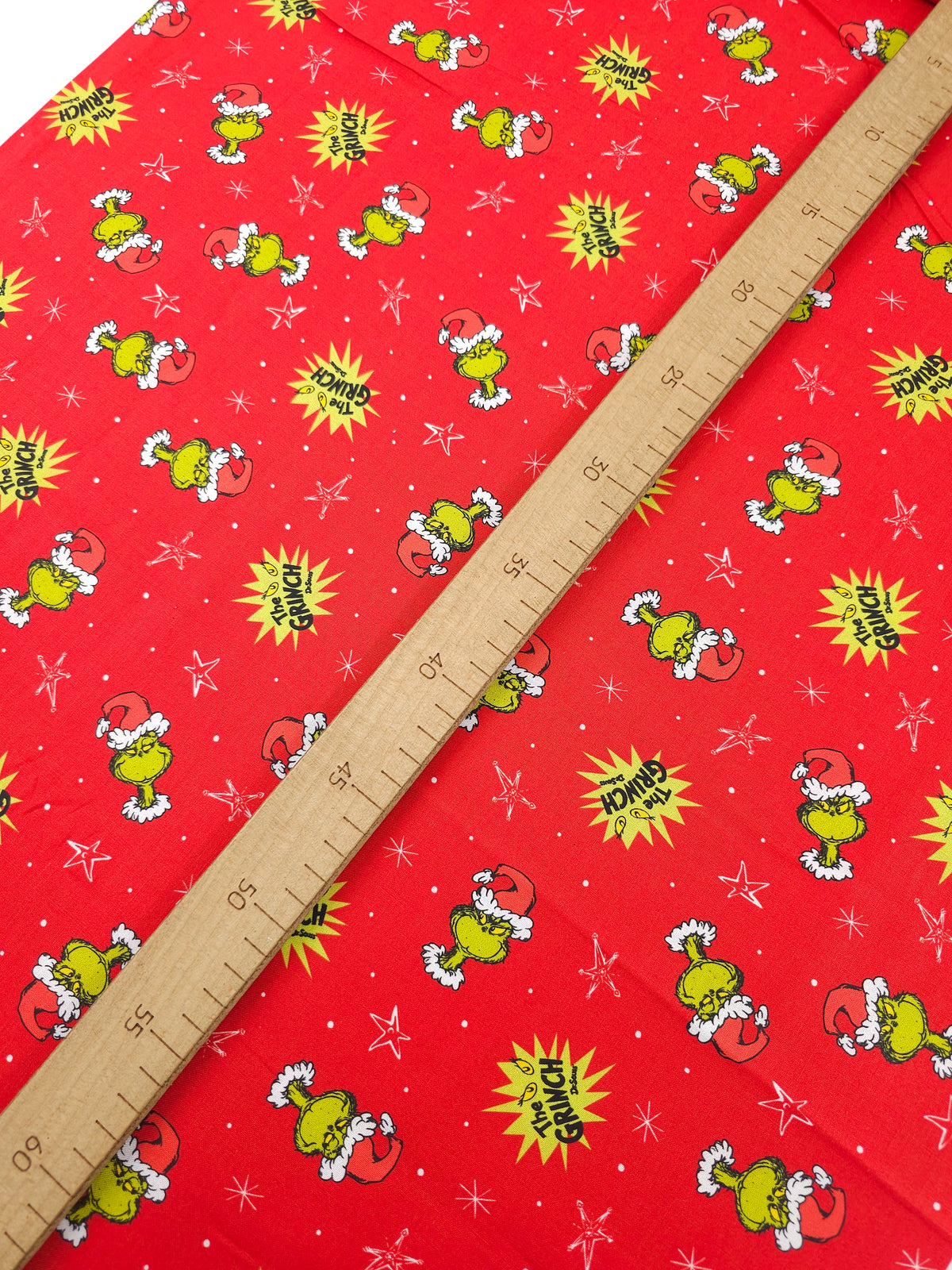 The Grinch Tossed Heads 100% Cotton - Robert Kaufman