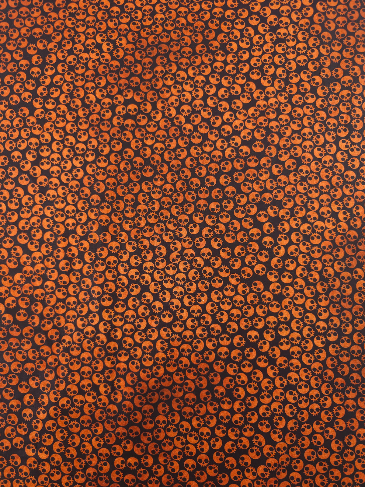 Orange/Black Tossed Skull Heads 100% Cotton - Robert Kaufman
