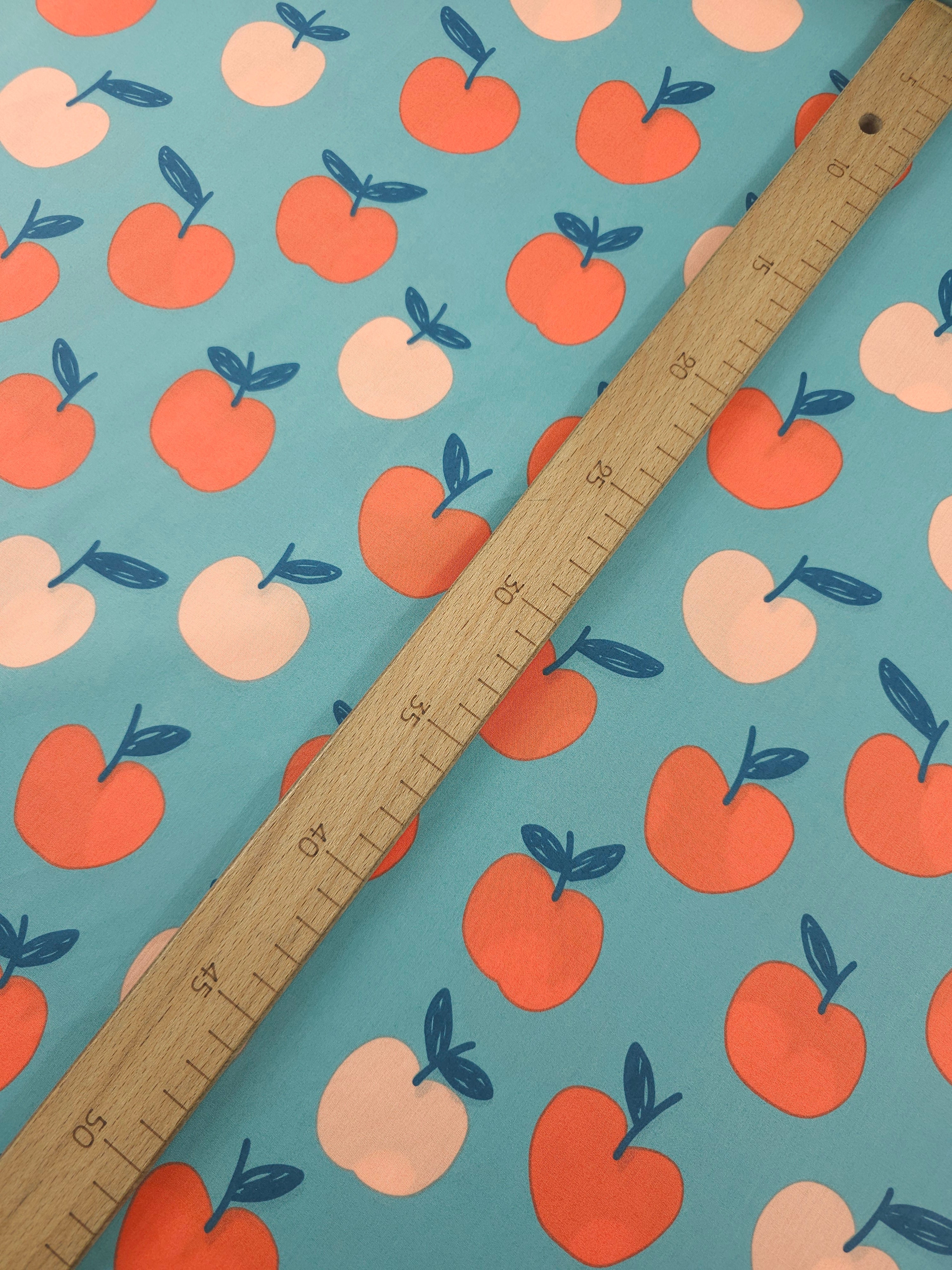 Aqua Blue Floating Apples 100% Cotton 60"