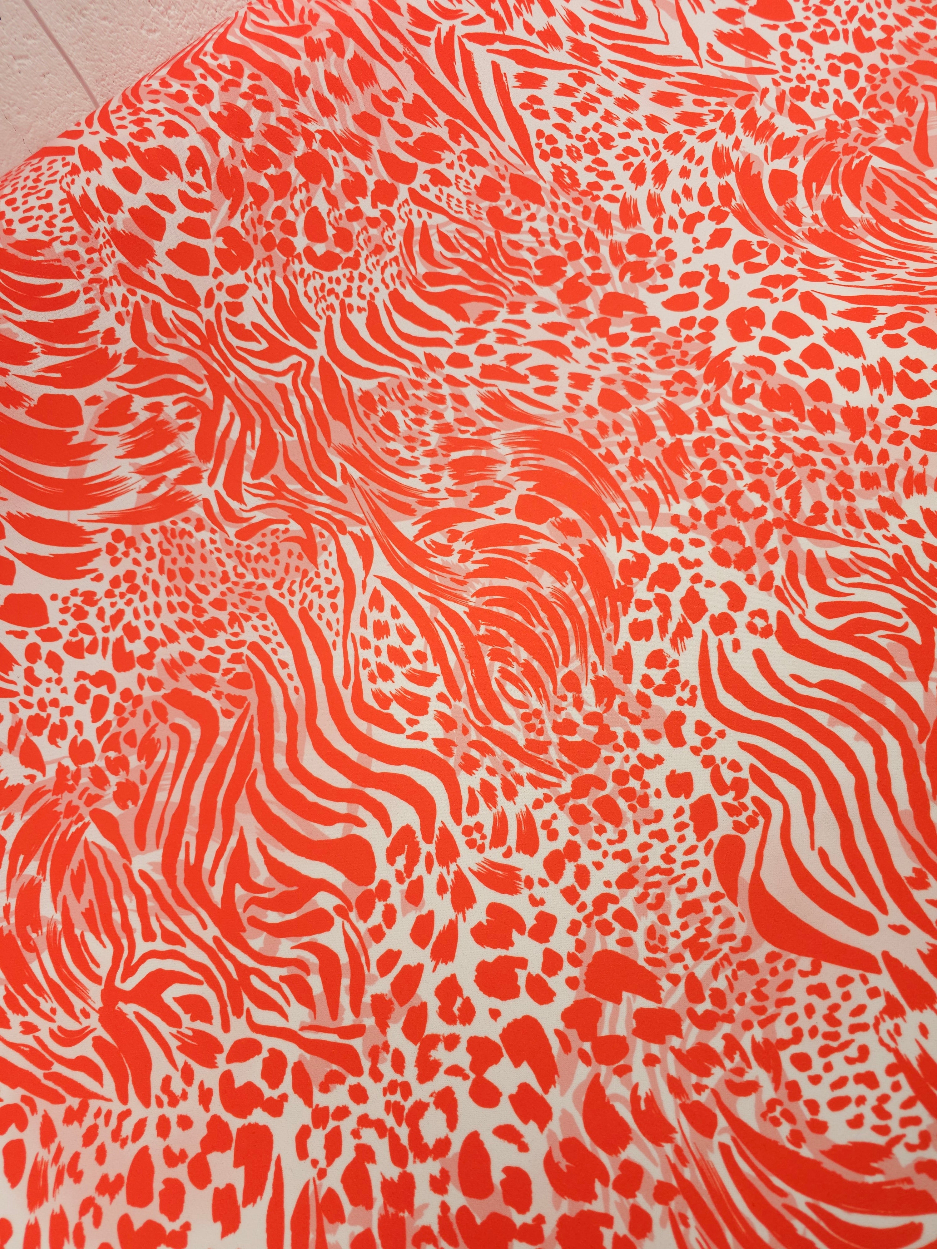 Orangey Red/White Animal Print Poly Jersey