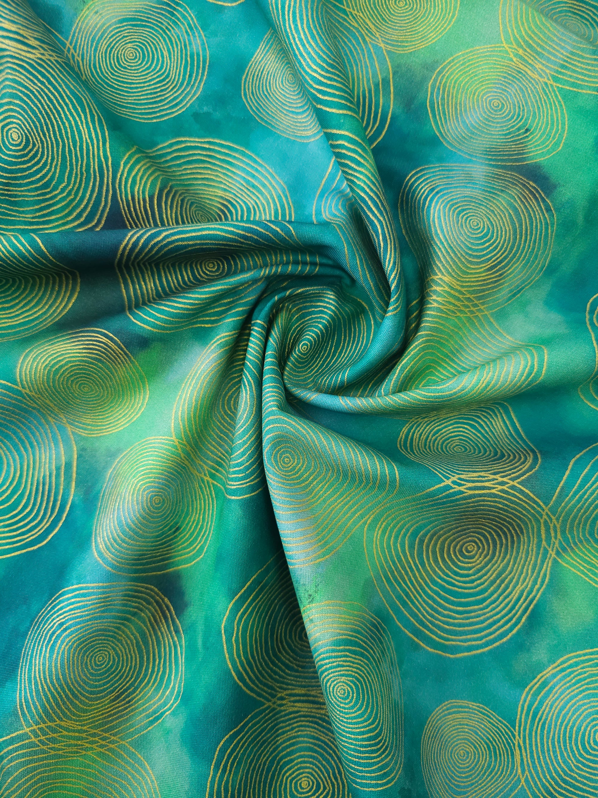Green/Teal Chromaticity Swirl Ring 100% Cotton - Robert Kaufman