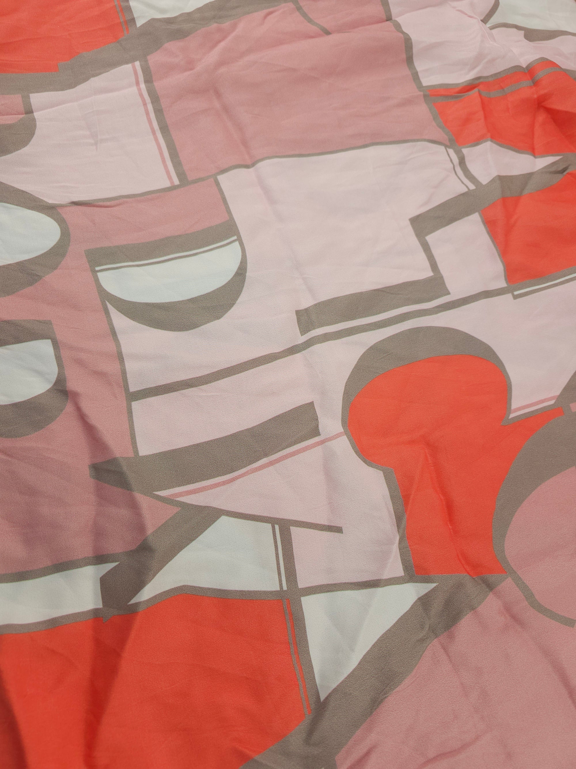 Salmon geometric lettering Viscose sateen- 2.3m piece