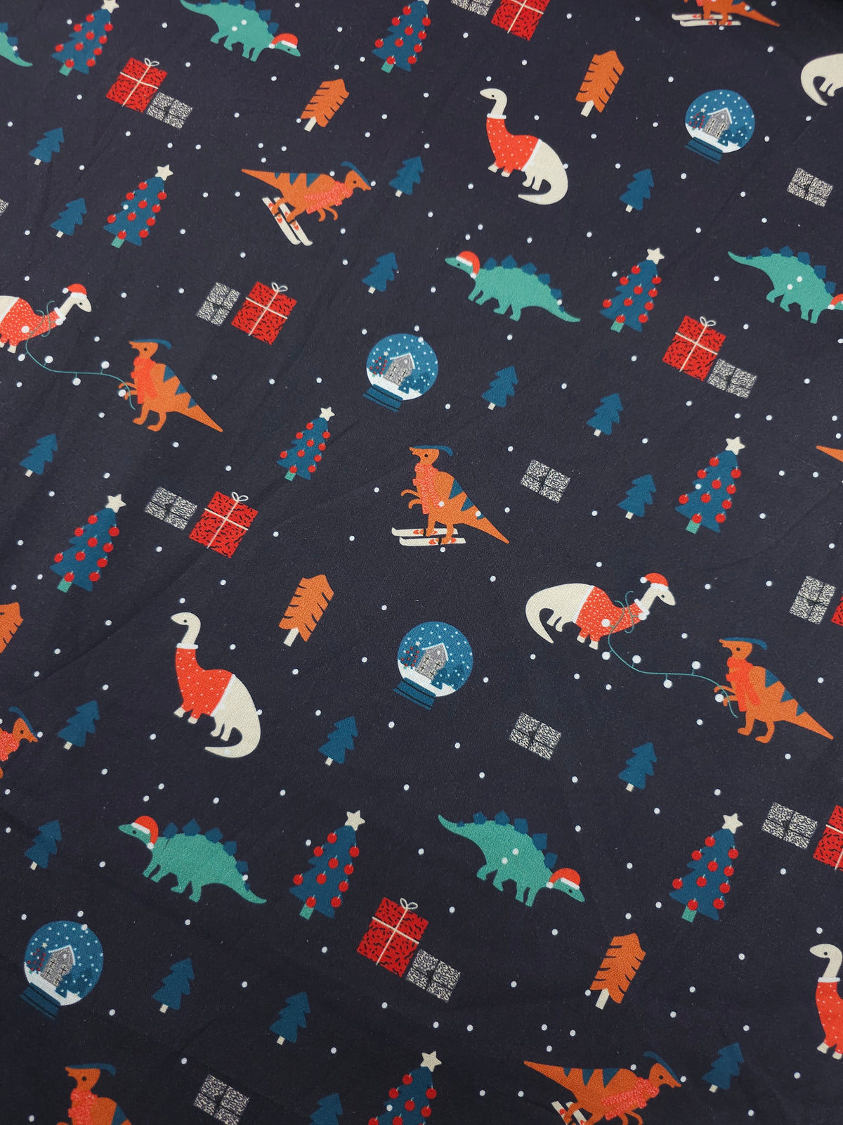 Indigo Navy Dino Christmas 100% Cotton - Joann