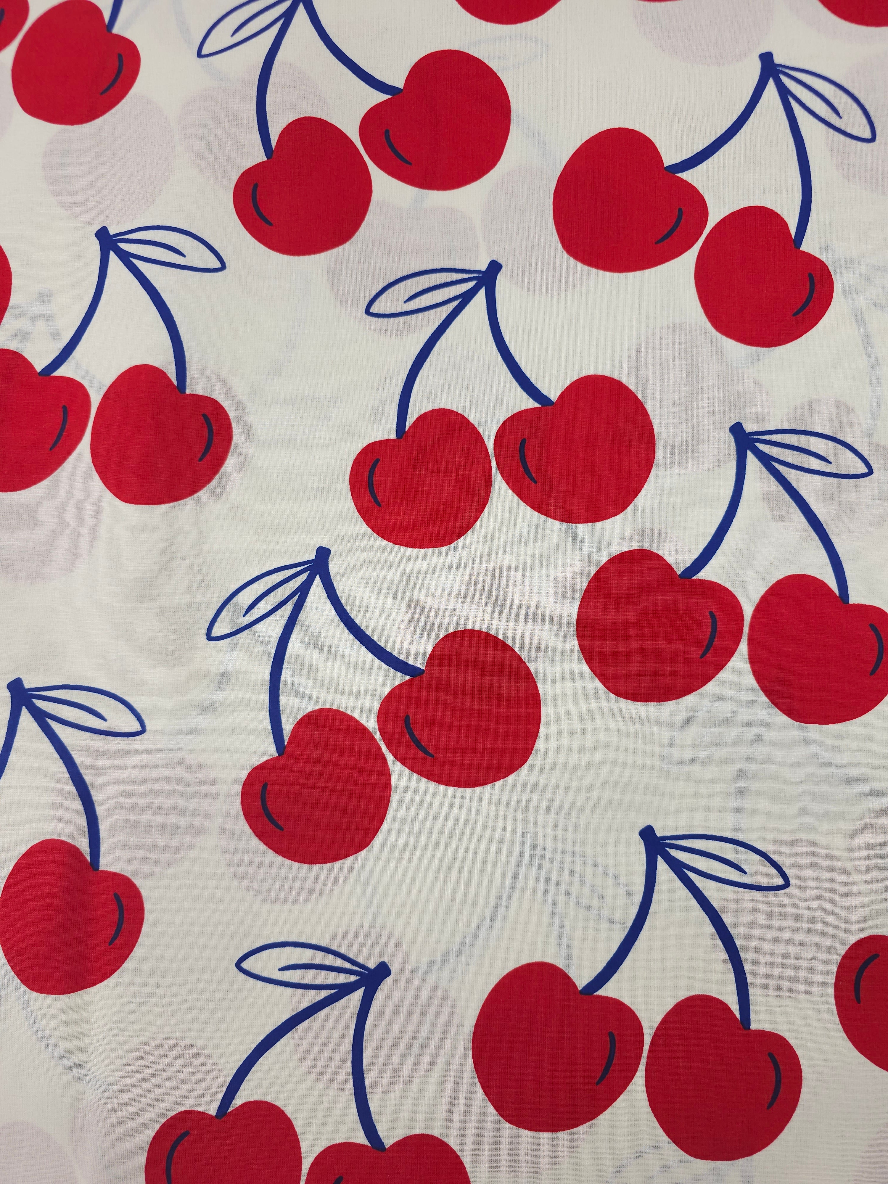Ivory/Red Large Cherries Coated Cotton 60"