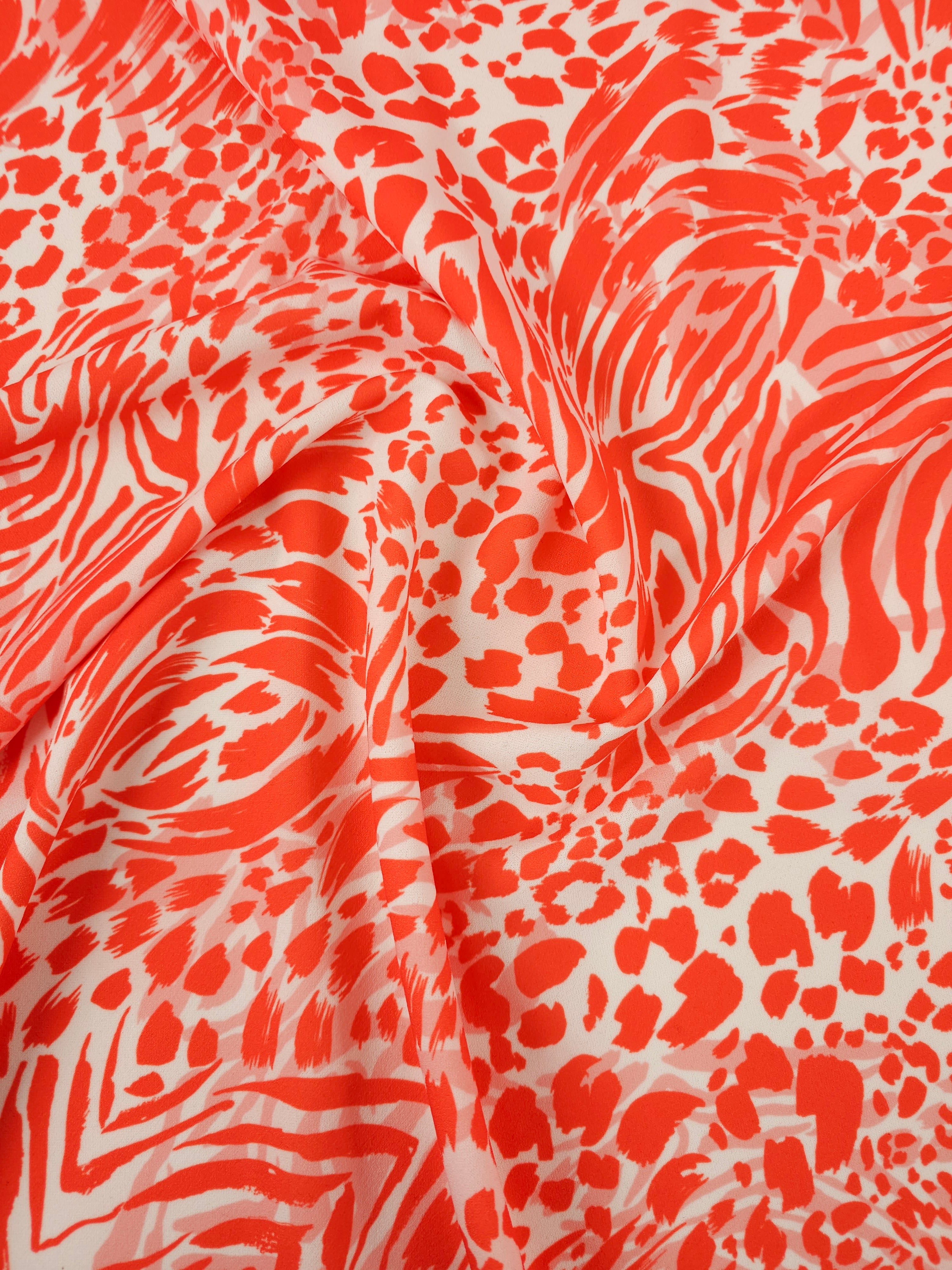 Orangey Red/White Animal Print Poly Jersey
