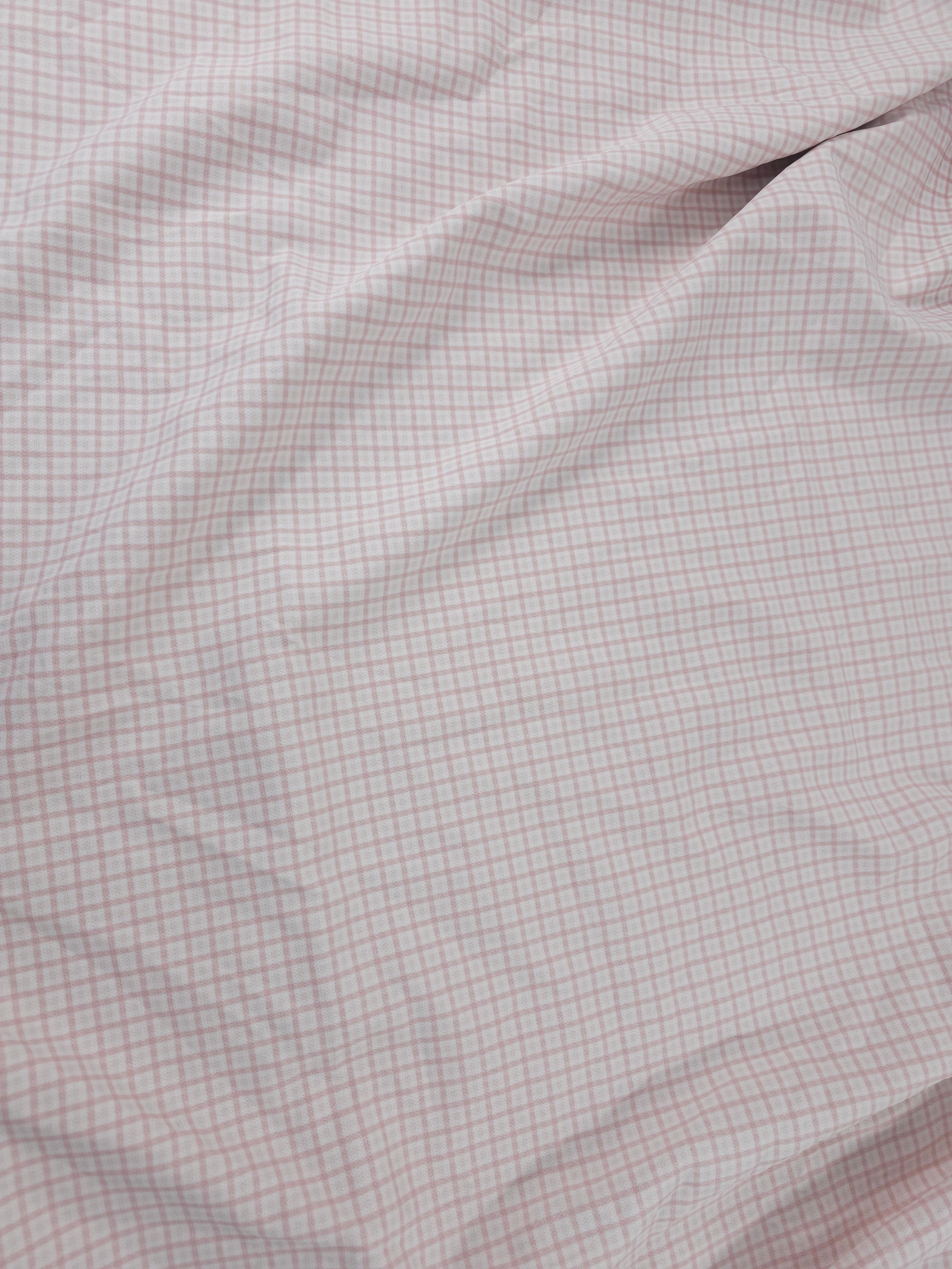Pale pink grid Polystretch- 2.2m piece