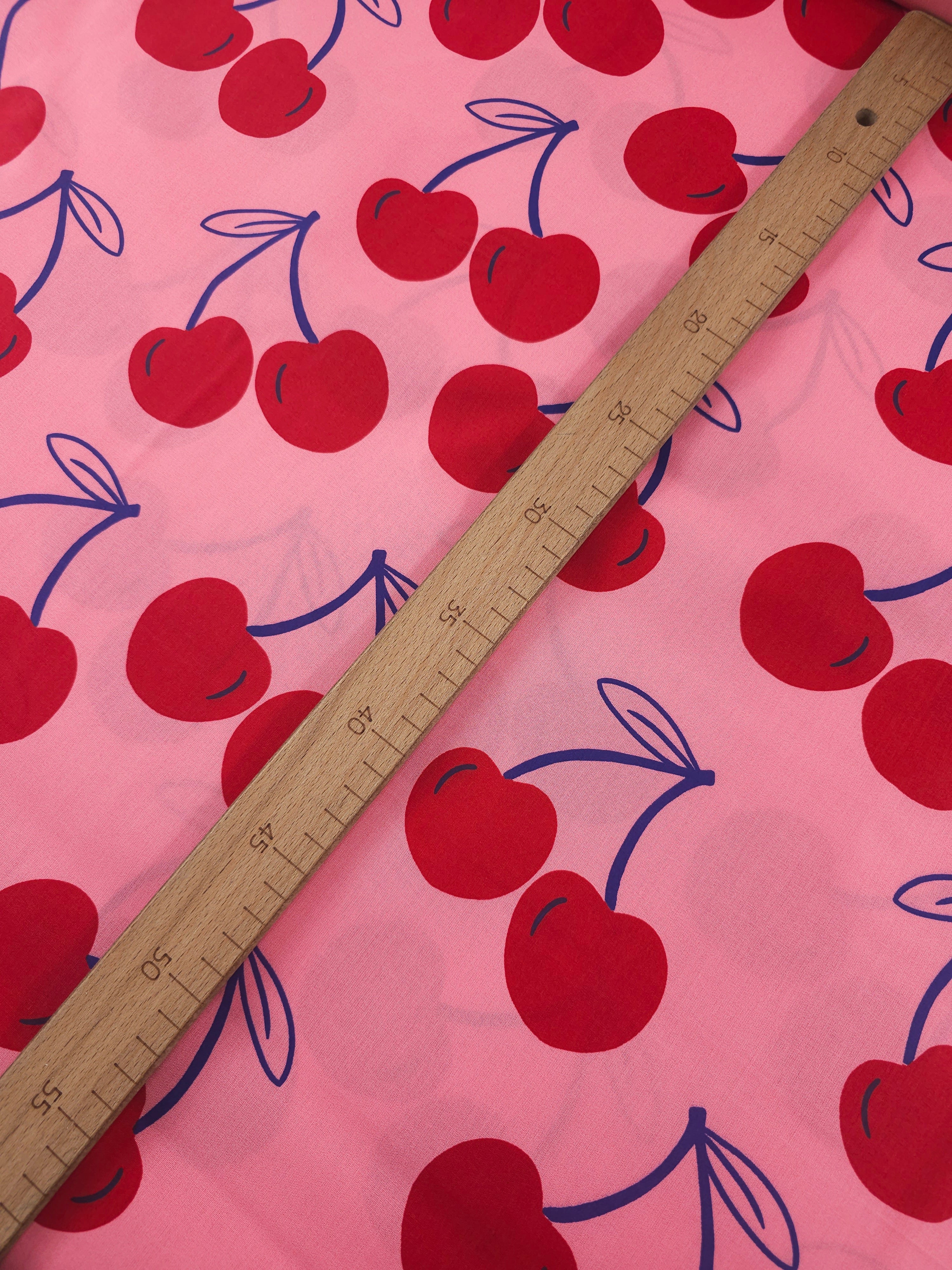 Fuchsia Pink Large Cherries Coated Cotton 60"
