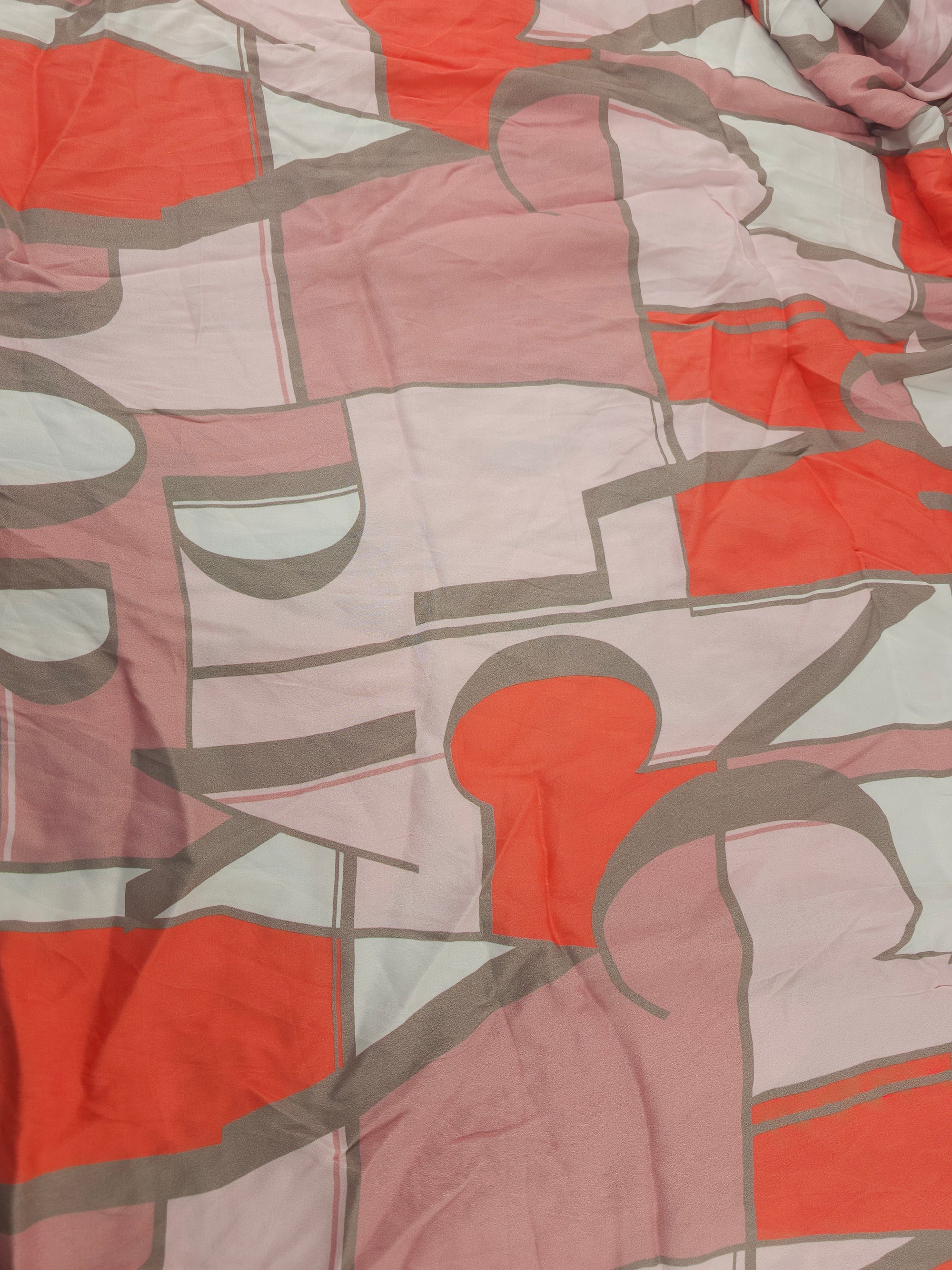 Salmon geometric lettering Viscose sateen- 2.3m piece