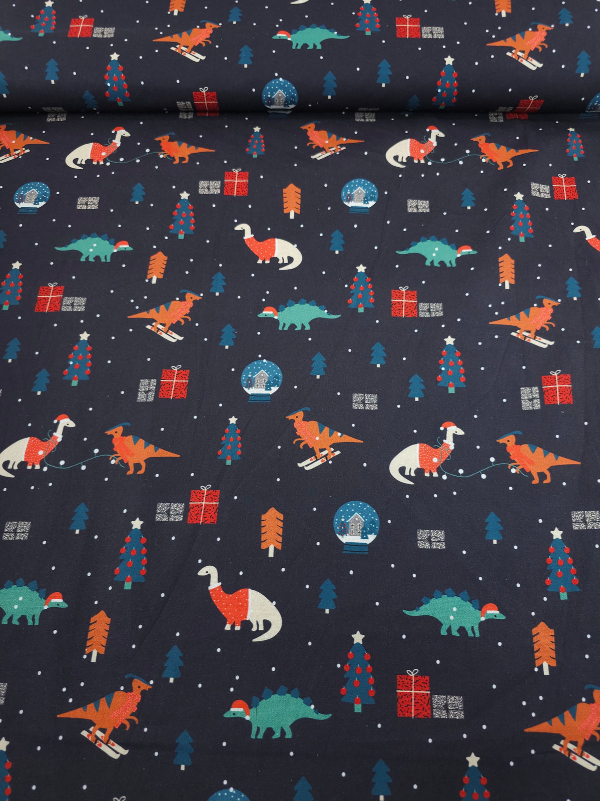 Indigo Navy Dino Christmas 100% Cotton - Joann