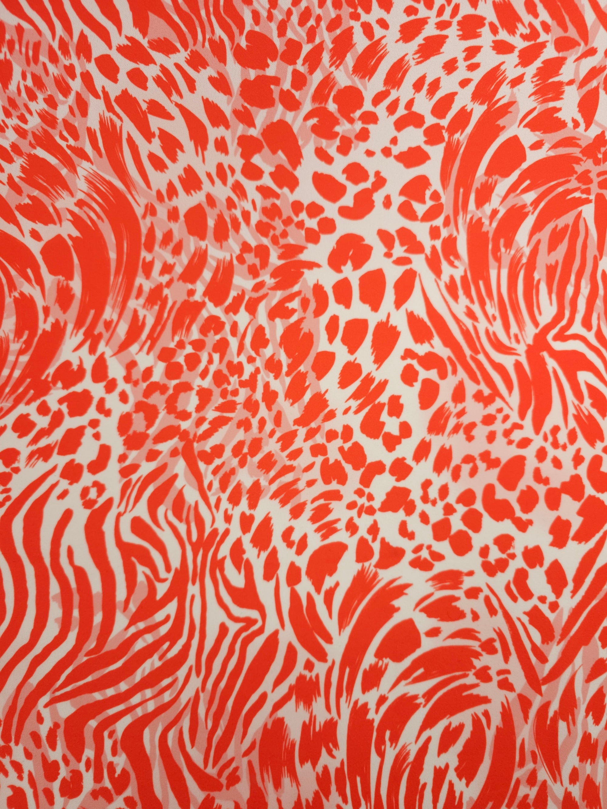 Orangey Red/White Animal Print Poly Jersey