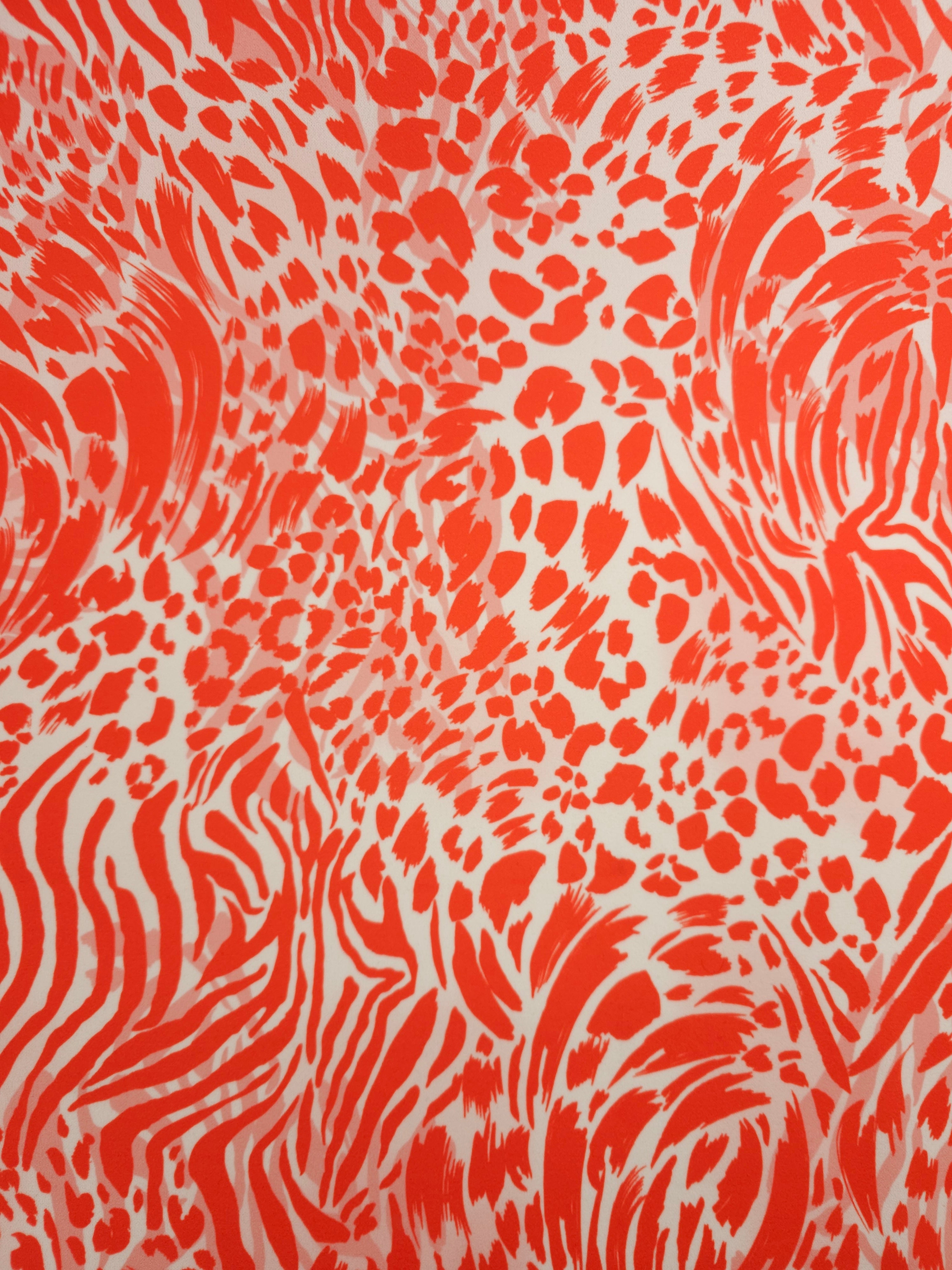 Orangey Red/White Animal Print Poly Jersey