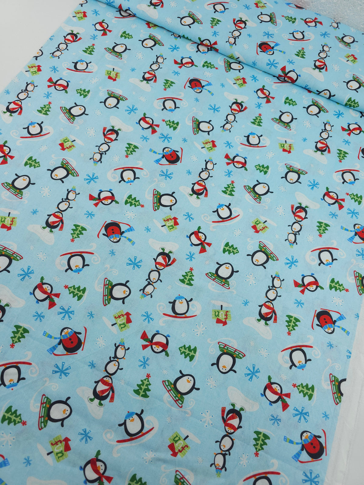 Novelty Snowboarding Penguins 100% Cotton - Joann